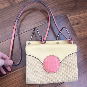 Never Used Vibrant Yellow and Pink Crossbody Bag with Circular Emblem